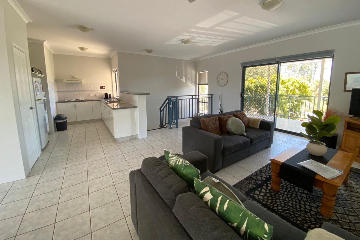 Open plan living with entrance to front balcony