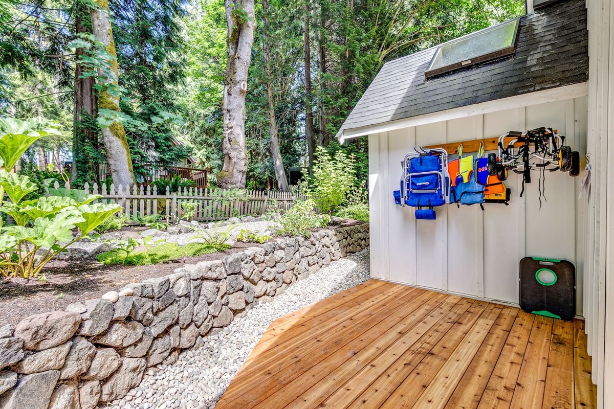 Folding beach chairs, a handful of life jackets, carts for the paddle boards, and yes, CORNHOLE!