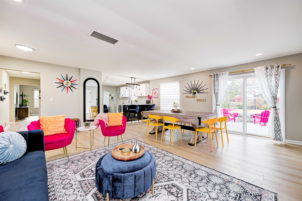 Open living/dining area steps from the backyard firepit and sport court — the perfect hub for meals, conversation, and memory-making.