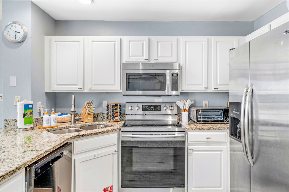 The kitchen includes an air fryer for convenient, healthy meals, a rice cooker, and a Keurig Duo coffee maker for your favorite brews. Dish/Hand soap provided for your cleaning needs.