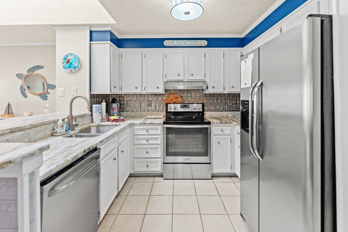Beautiful updated kitchen with new appliances, stone counter tops