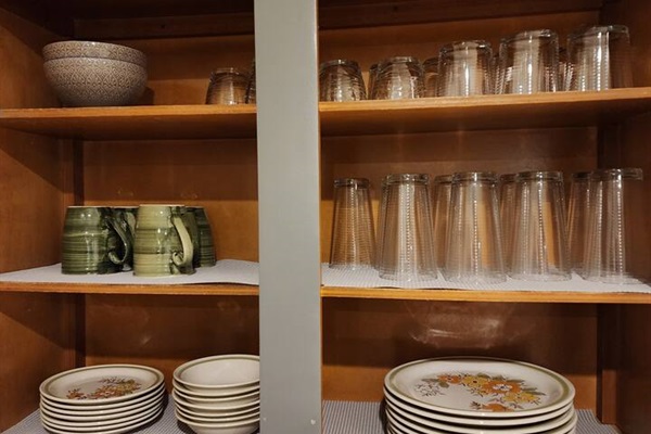 Cabinet fully stocked for a nice family dinner. 