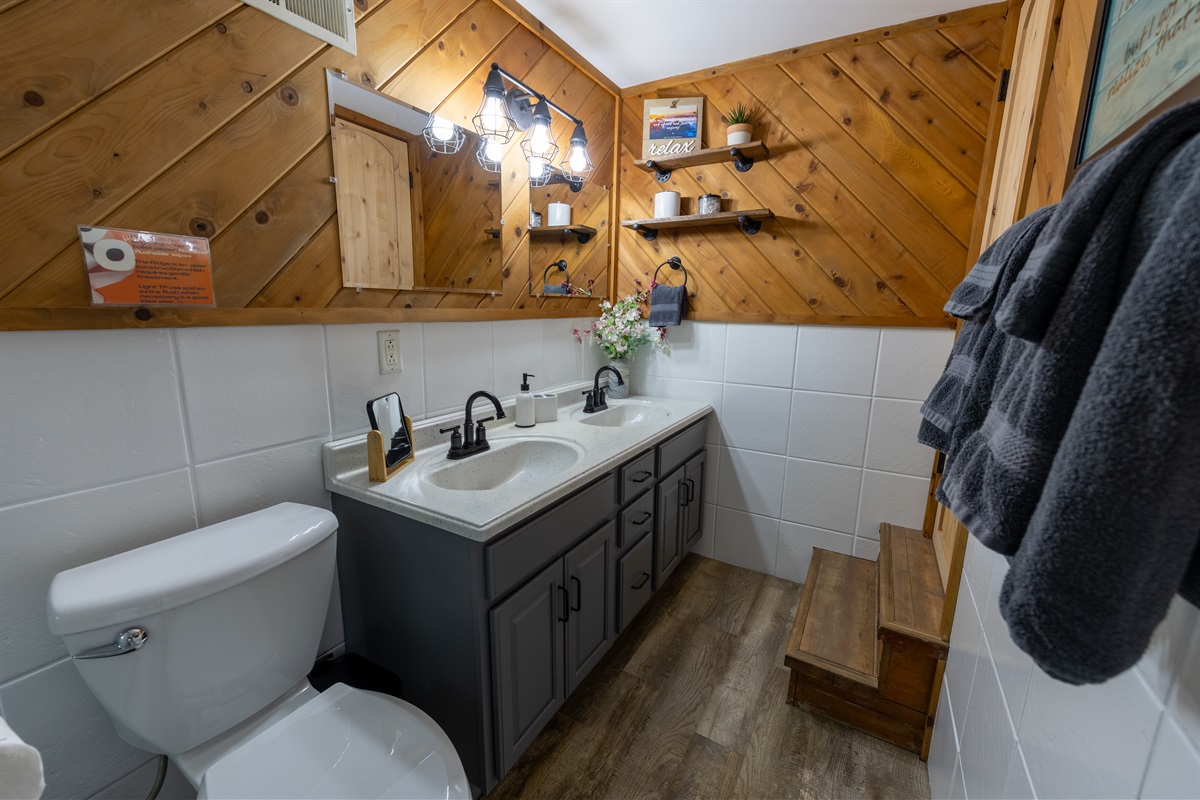 Freshen up in the sparkling clean full bath with all the essentials provided. Fluffy towels, hair dryer, soaps and magnifying mirror all included.