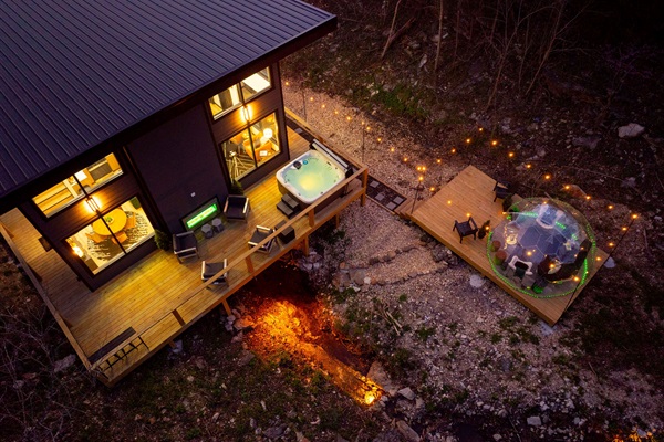 Your own secluded 2-acre escape, surrounded by forest and flowing water