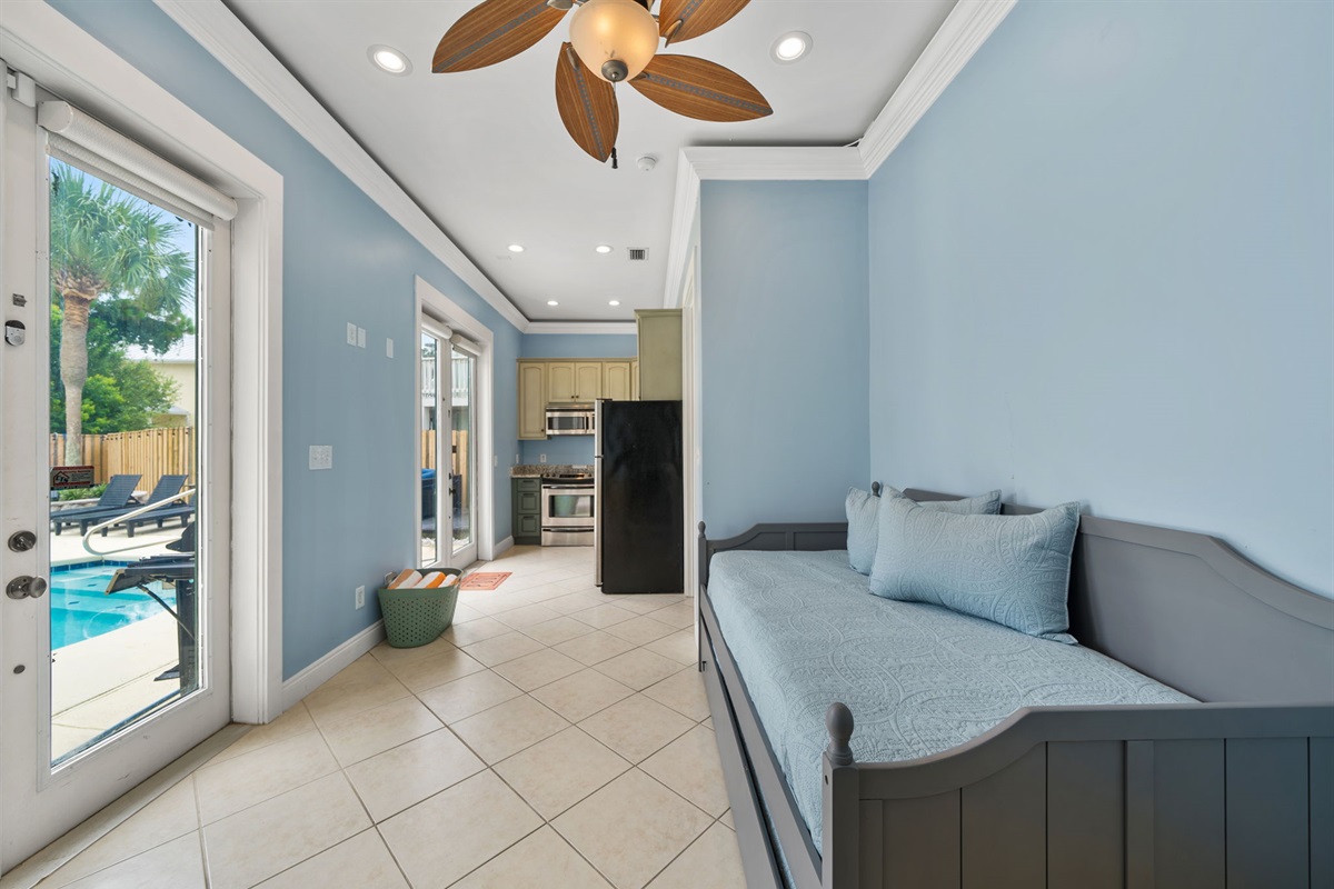 Kitchenette and bonus sleeping area... Has a daybed with two cozy twins if needed