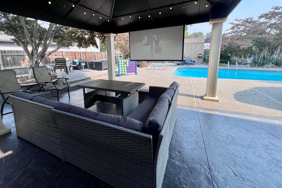 Enjoy your favorite movie or tv series on our outdoor movie theatre & fireplace.