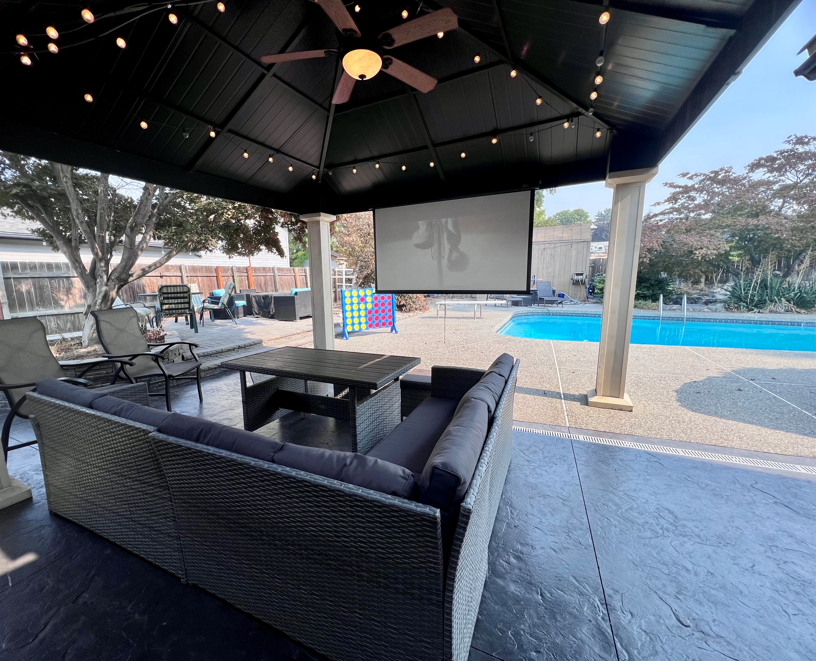 Enjoy your favorite movie or tv series on our outdoor movie theatre & fireplace.