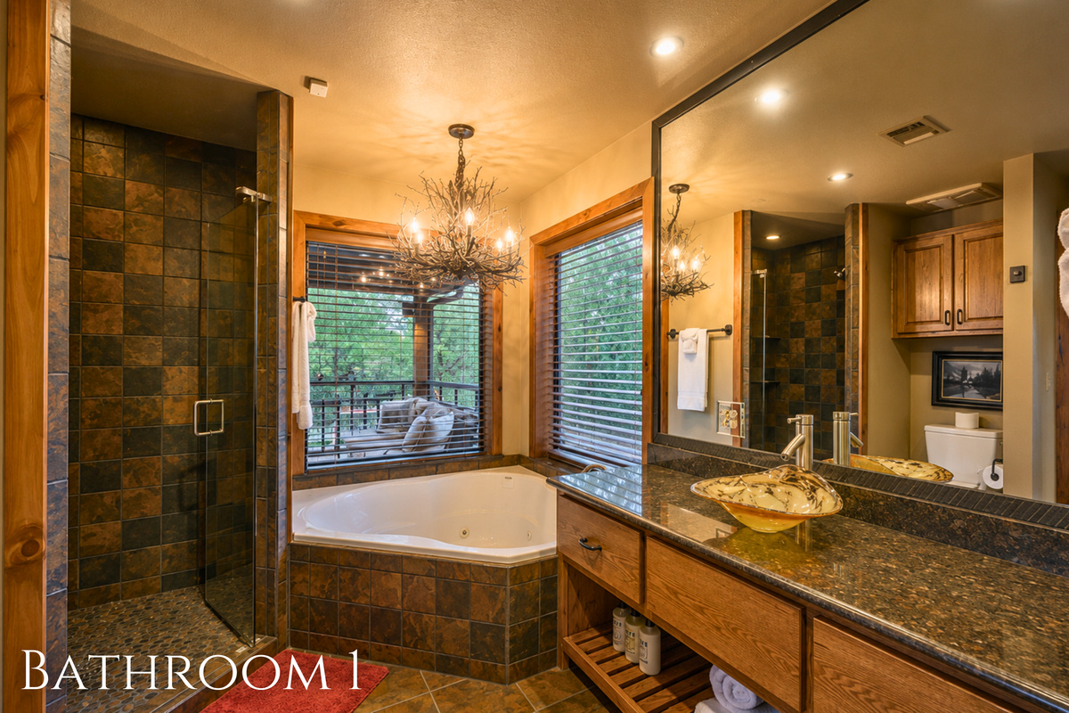 With a roomy vanity, generous counter space, and warm cabin finishes, this full bath offers plenty of room to get ready without feeling cramped.
