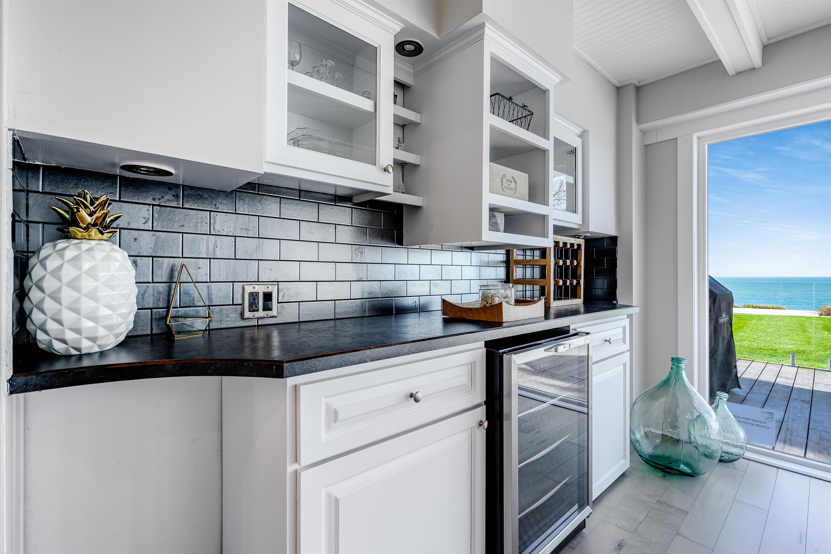 Bar area with mini fridge just off the deck