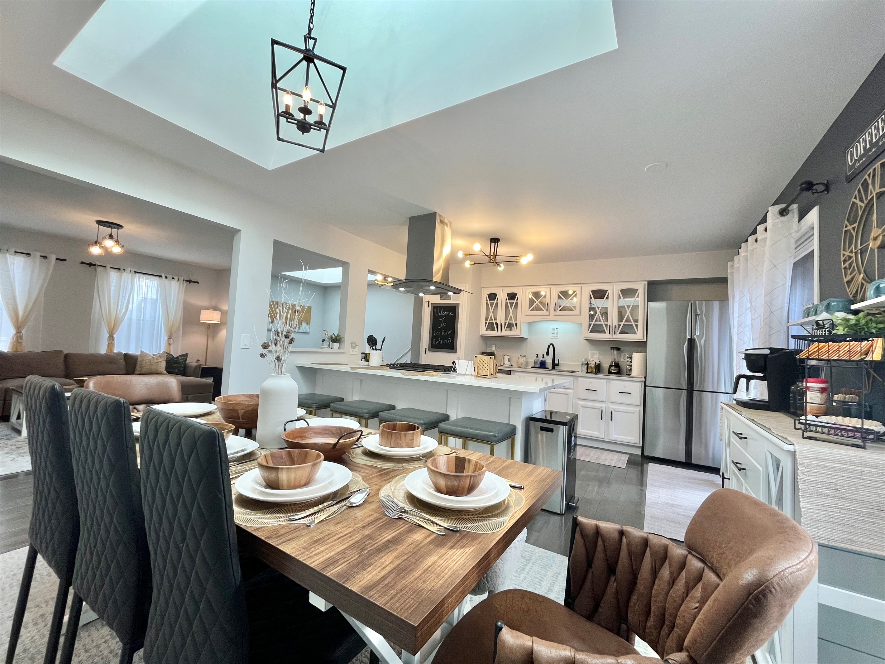 Open Kitchen opening to dining with island and skylight, Lots of natural light