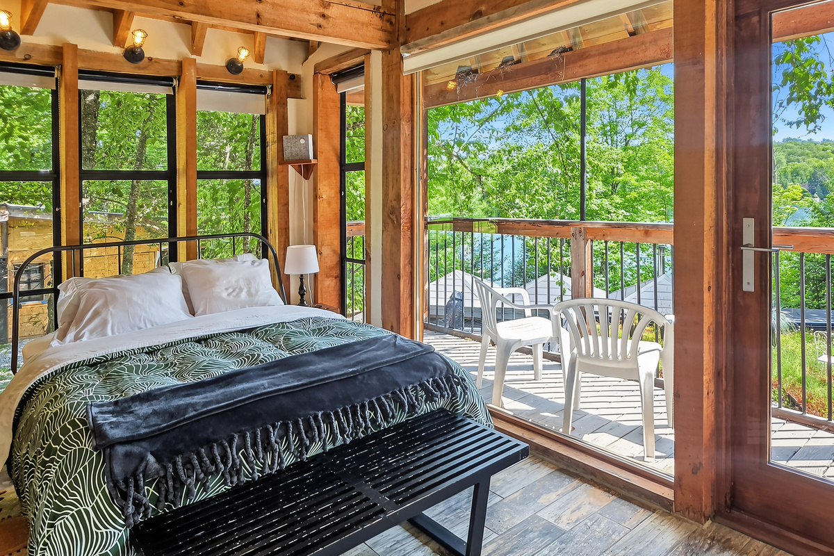 Teahouse interior - blinds up with balcony overlooking main cottage