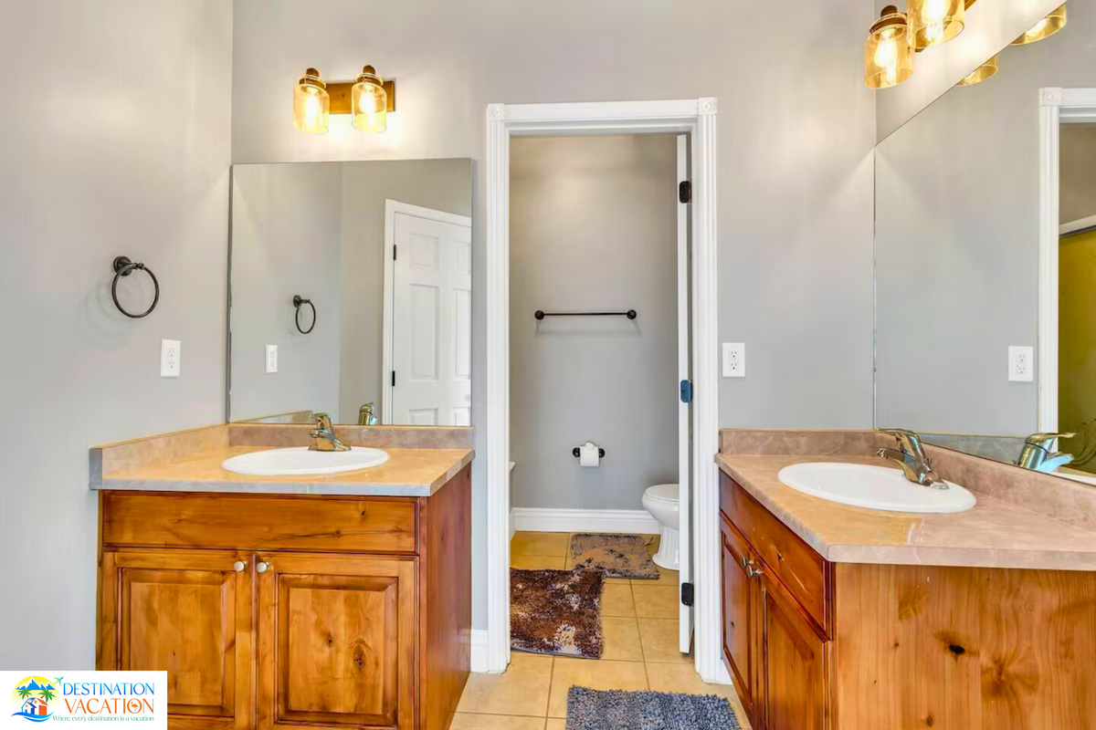 Warm wood cabinetry creates a refined bathroom retreat.