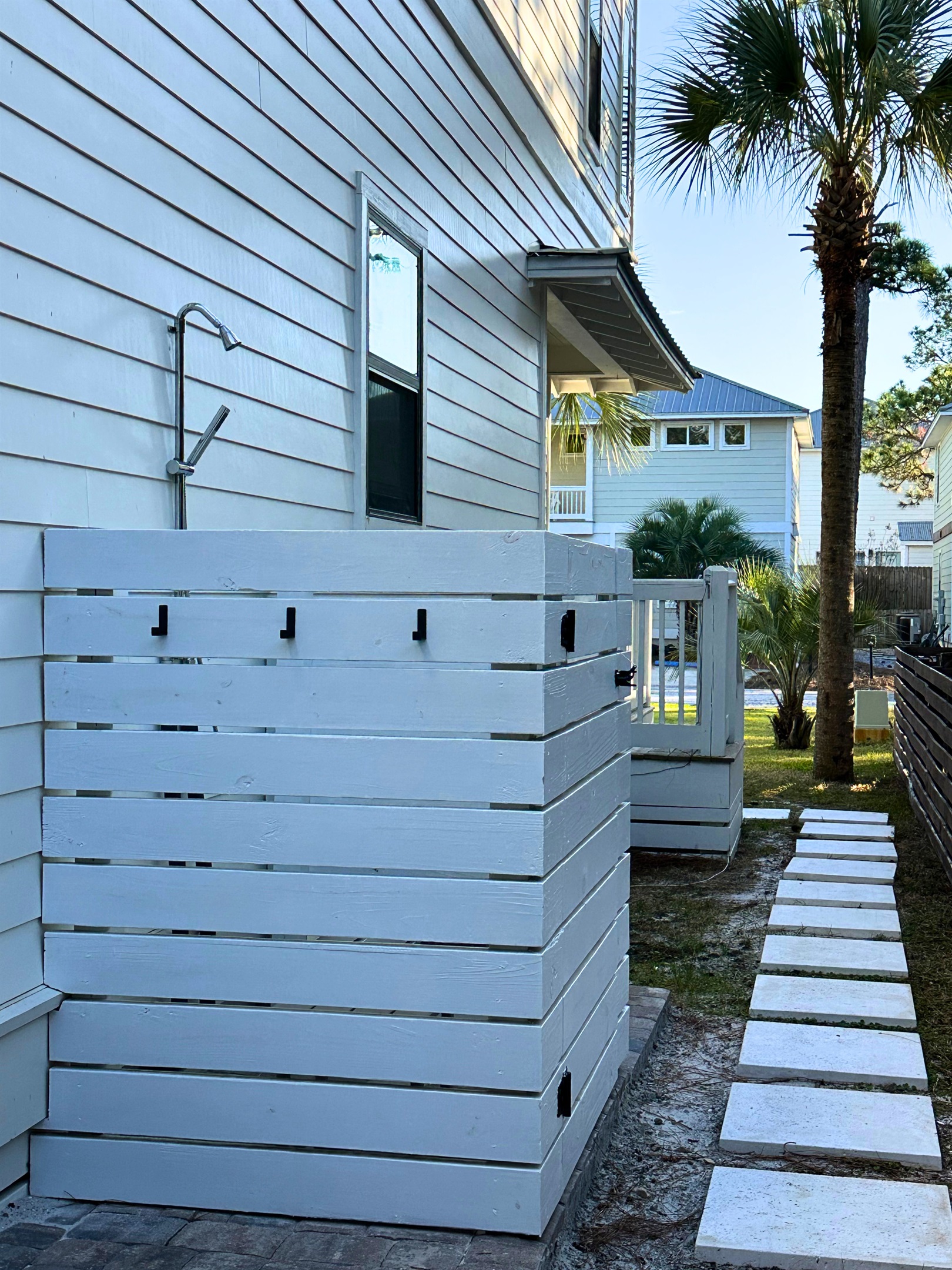 Outdoor shower with hot & cold water for rinsing off the sand after the beach