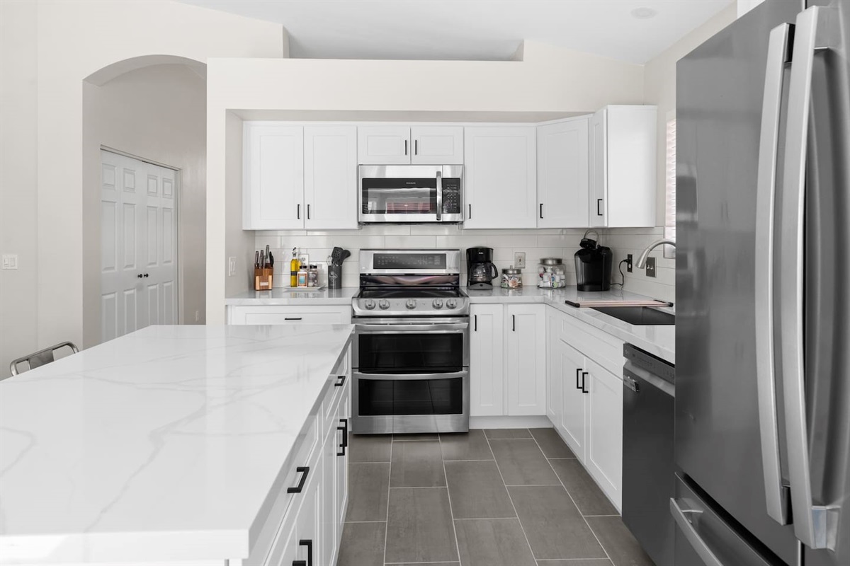 Our kitchen has been remodeled with nice appliances and everything you need to enjoy home cooked meals together.