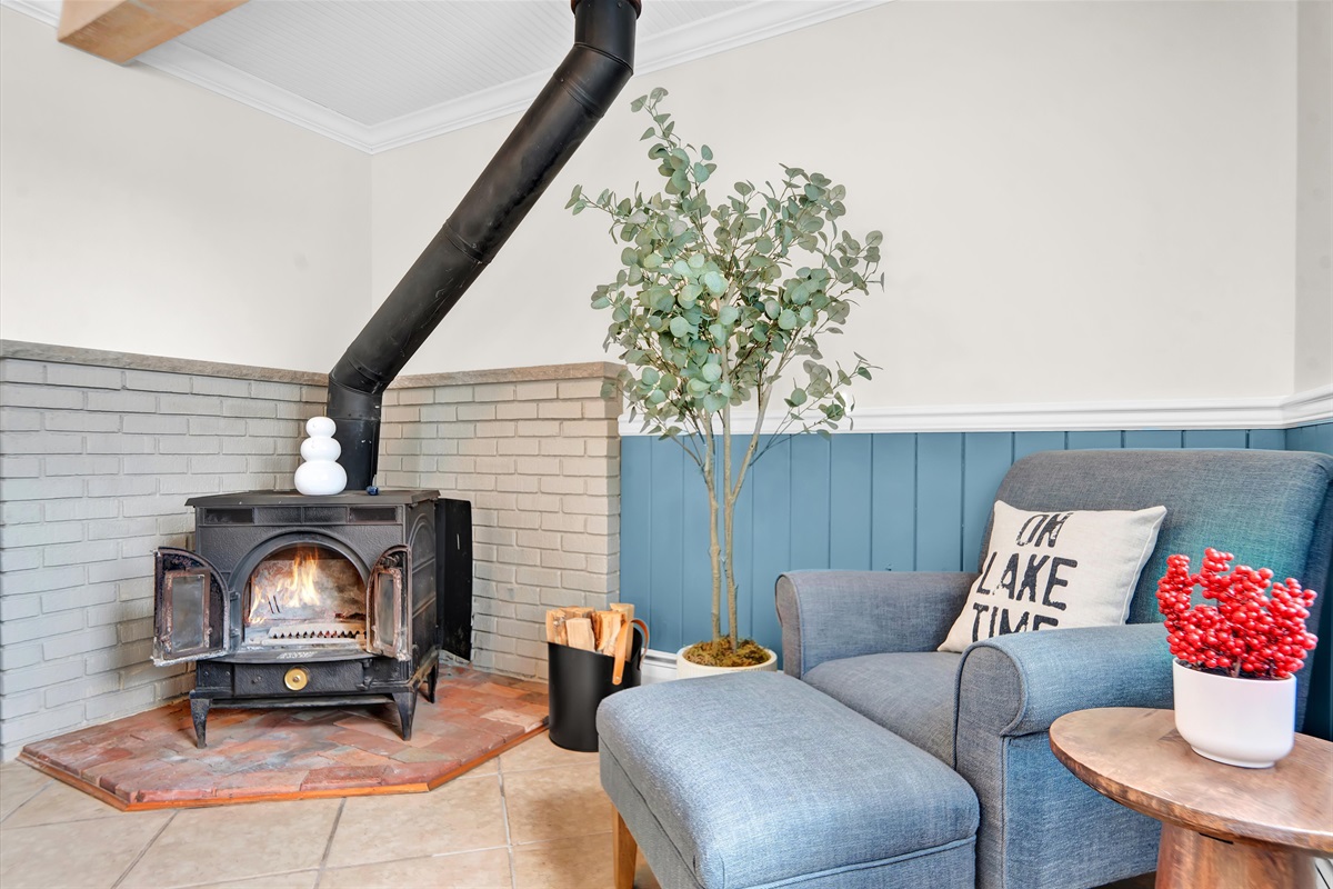 Crackling wood stove — the perfect winter retreat.