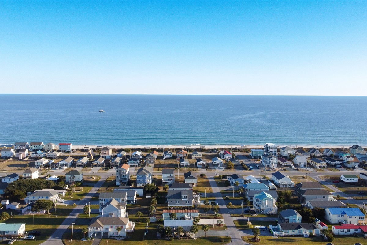 The home sits close to the shoreline