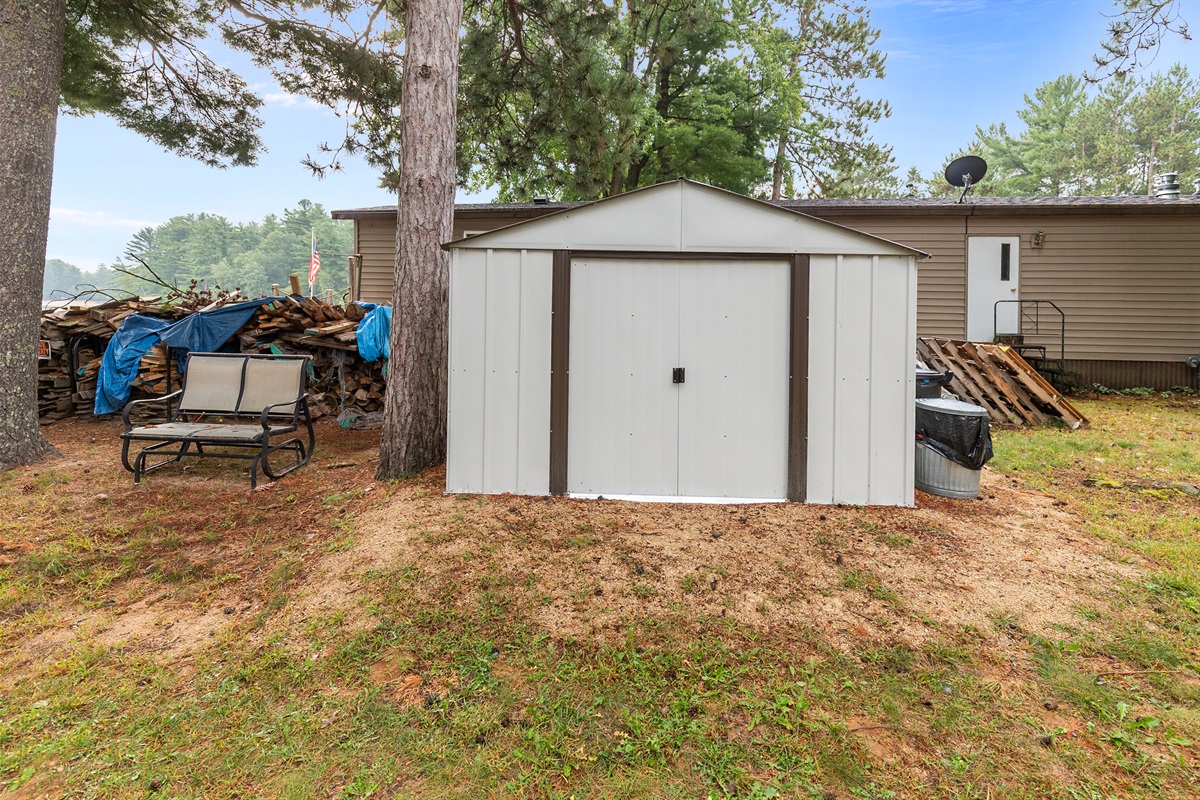 The white shed across from the house entrance is stocked with life jackets and other lake amenities for your use.