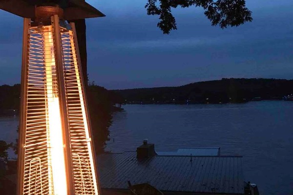 Outdoor propane fire heater in stylish flame glass tube for those chilly nights.
