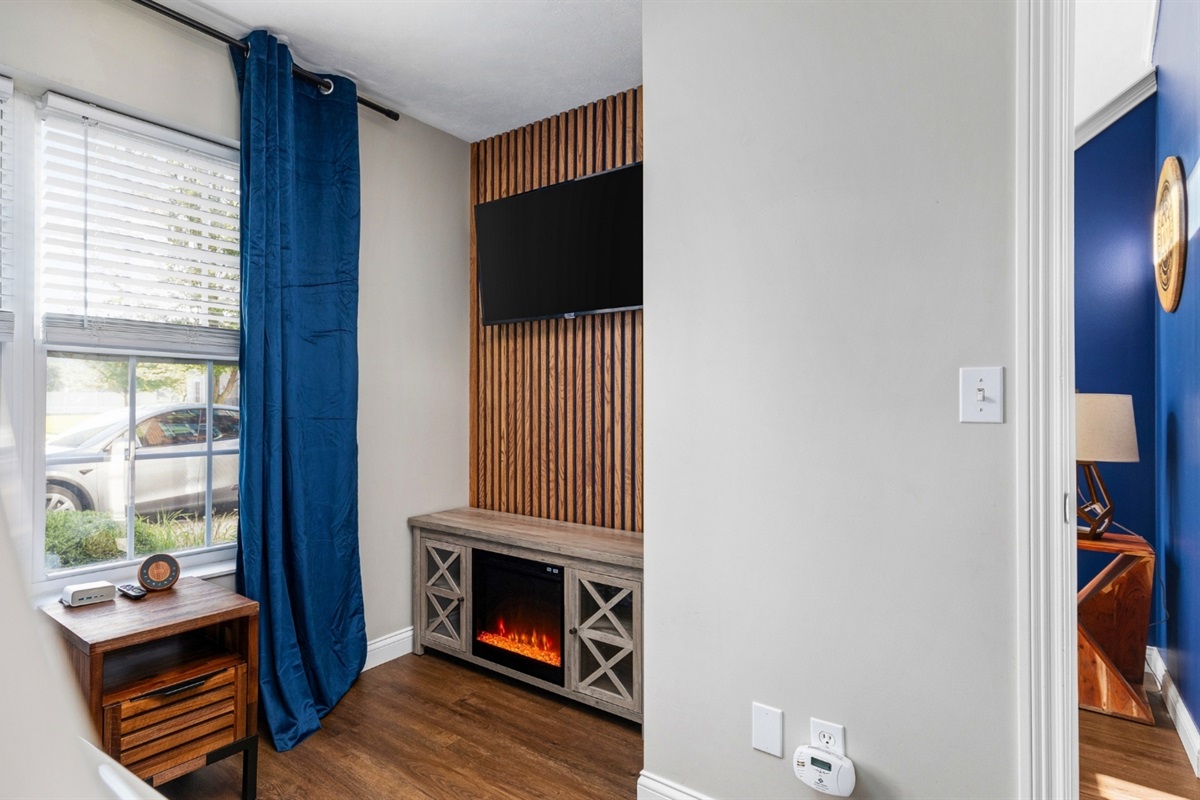 Cozy up to the electric fireplace in the 1st floor bunk room on those crisp fall South Bend nights