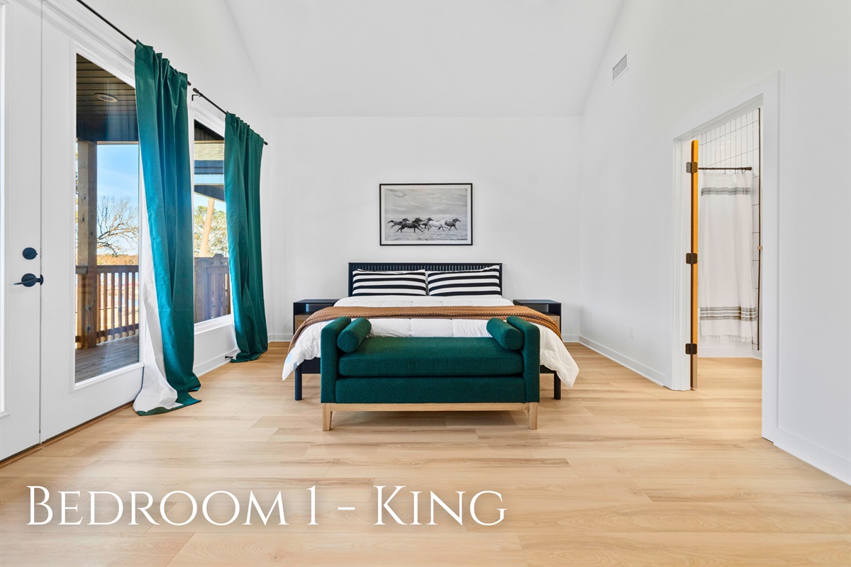 This bedroom offers a quiet place to rest, with a comfortable bed and a calm, relaxing feel.