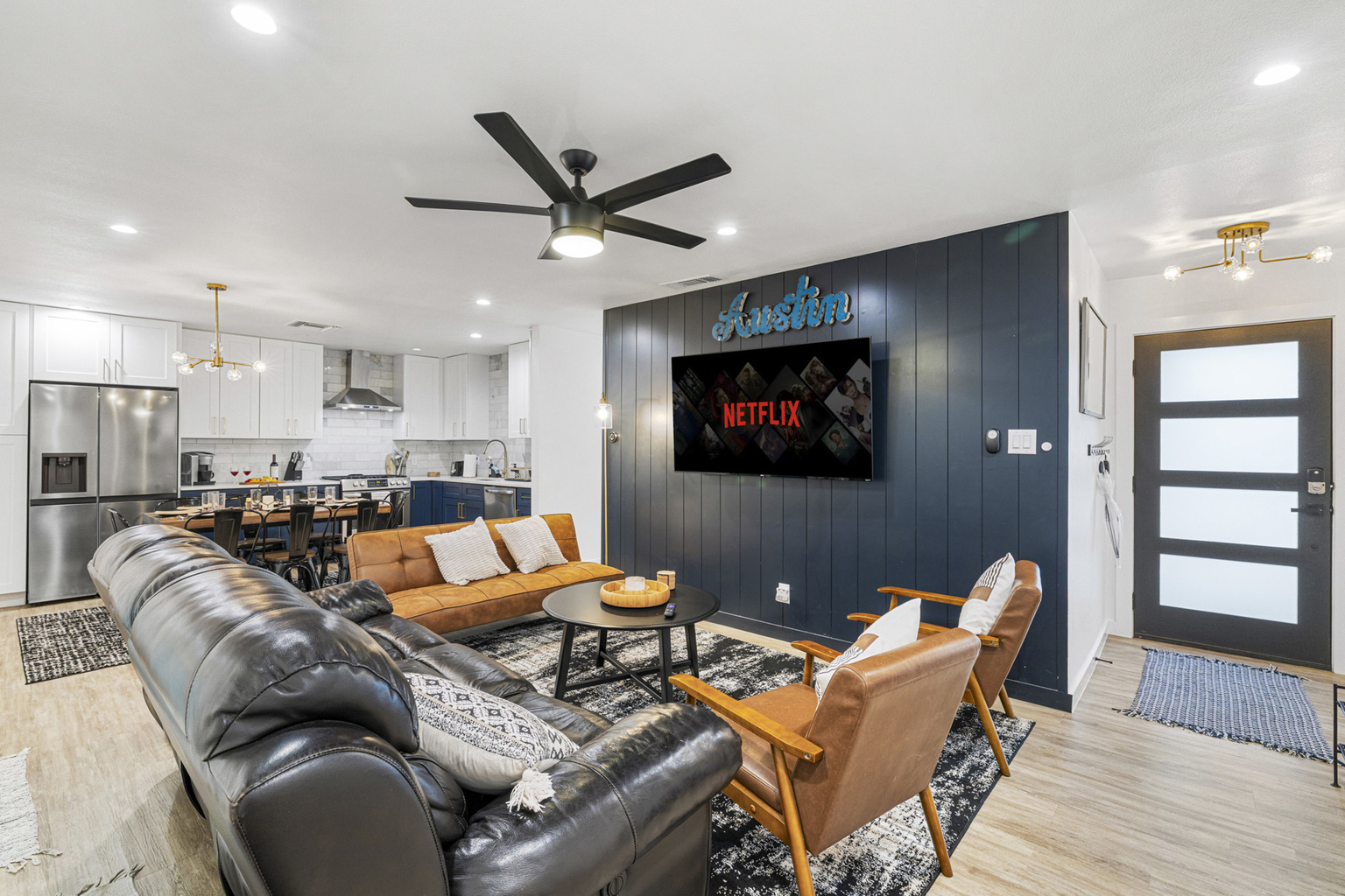 Stylish space with sleek furniture, perfect for movie nights or gathering with friends!