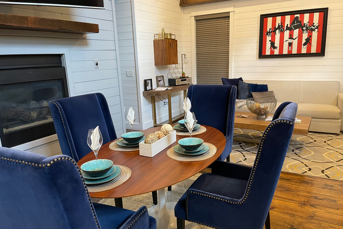 Elegant and comfortable dining space. Which, if you simply cannot get away from work, also makes a good space to set up shop.
