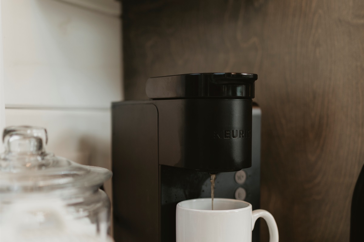 Start your mornings right at the cabin coffee bar. Brew a fresh cup, savor the quiet, and let the forest views wake you up slow. From sunrise sips to late-night refills, this little corner is made for coffee lovers.