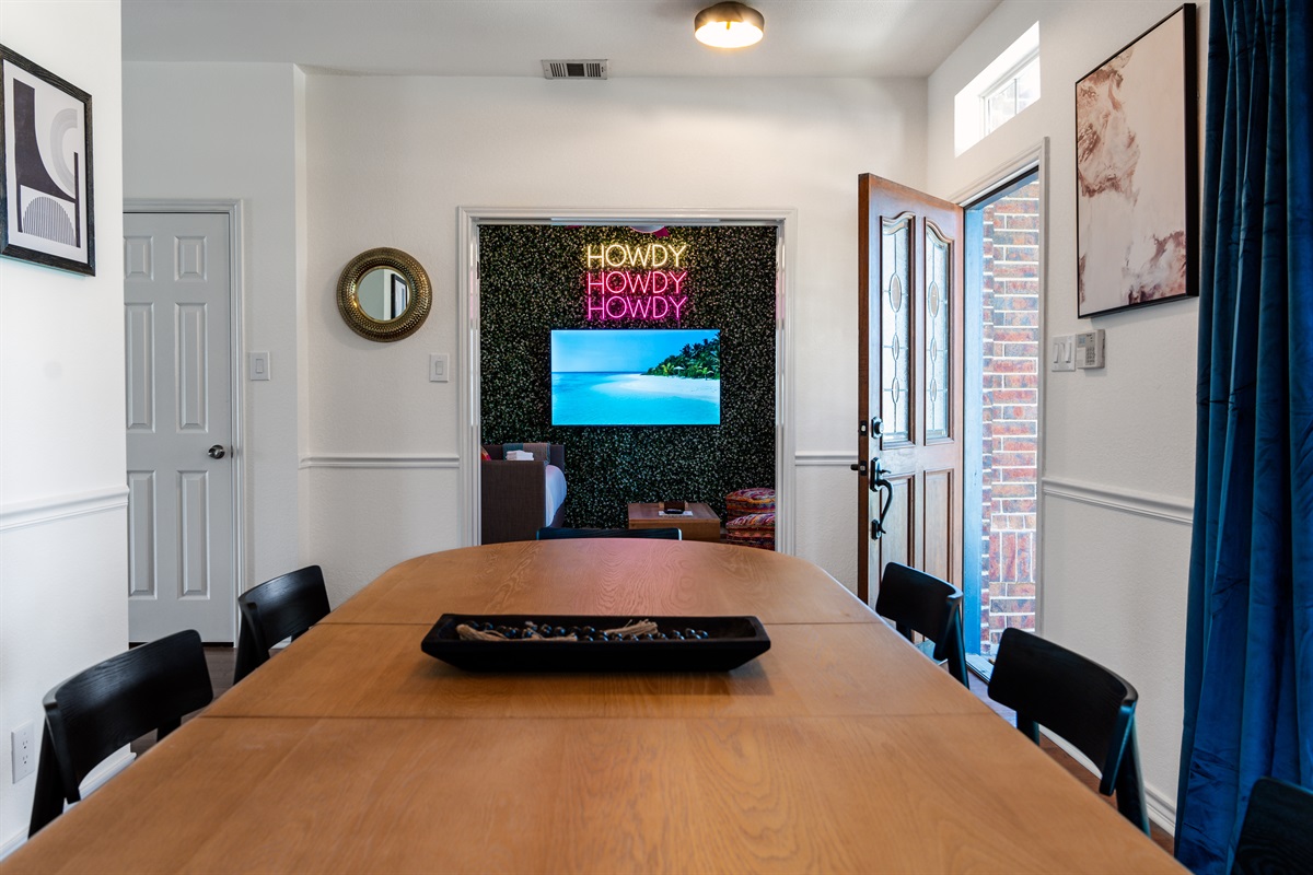 Casual dining area with 8 chairs directly right off the first-floor lounge room.