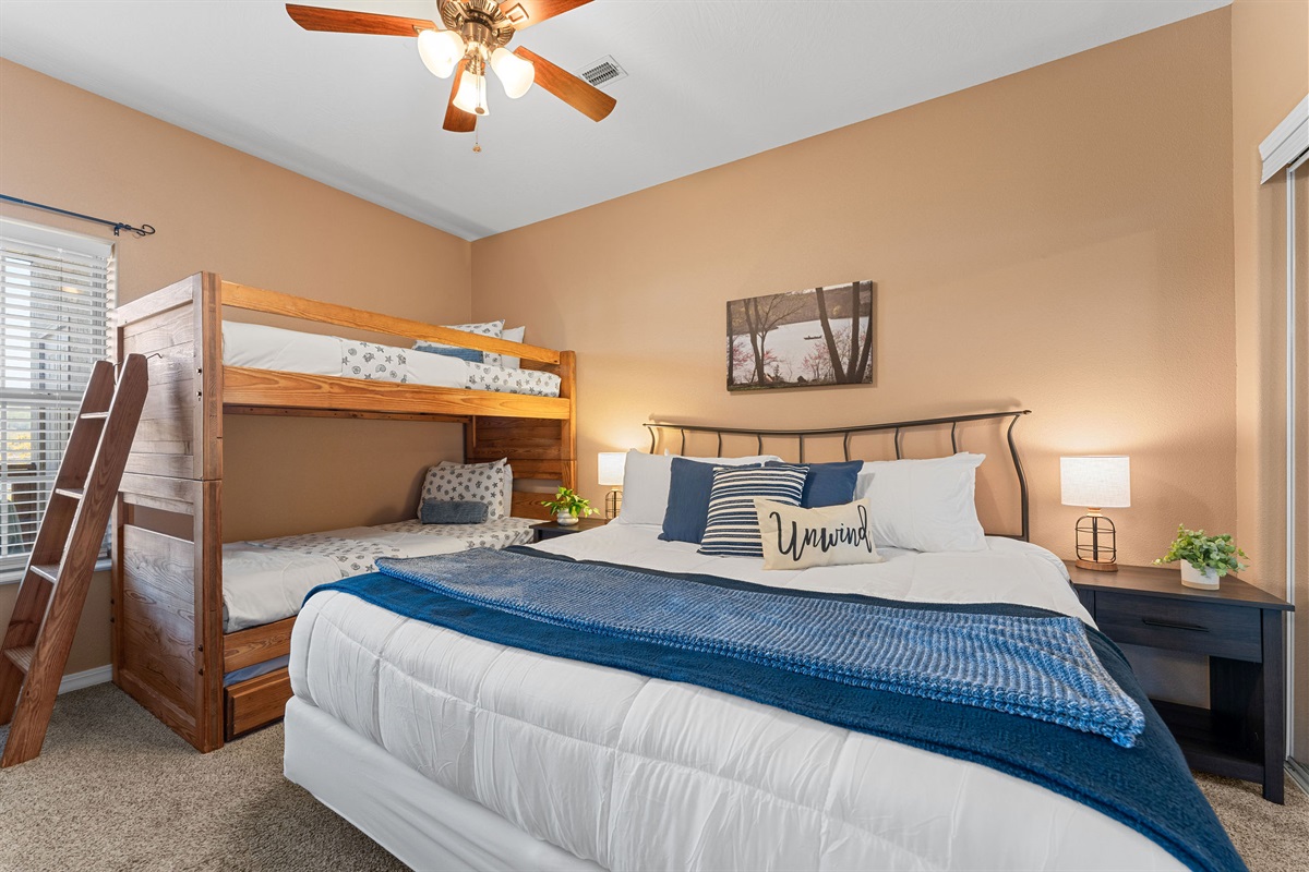 The third bedroom has a king bed and twin over twin bunks