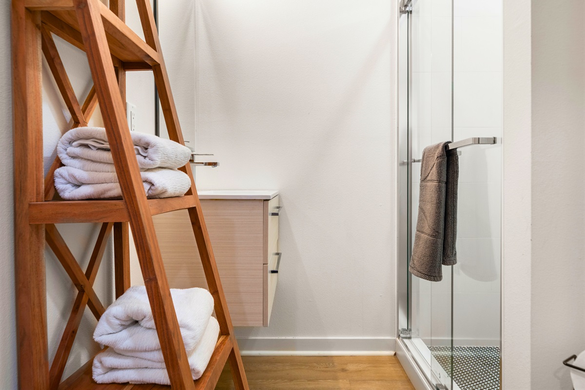 Bathroom 2 includes thoughtful storage and soft linens for a comfortable stay.