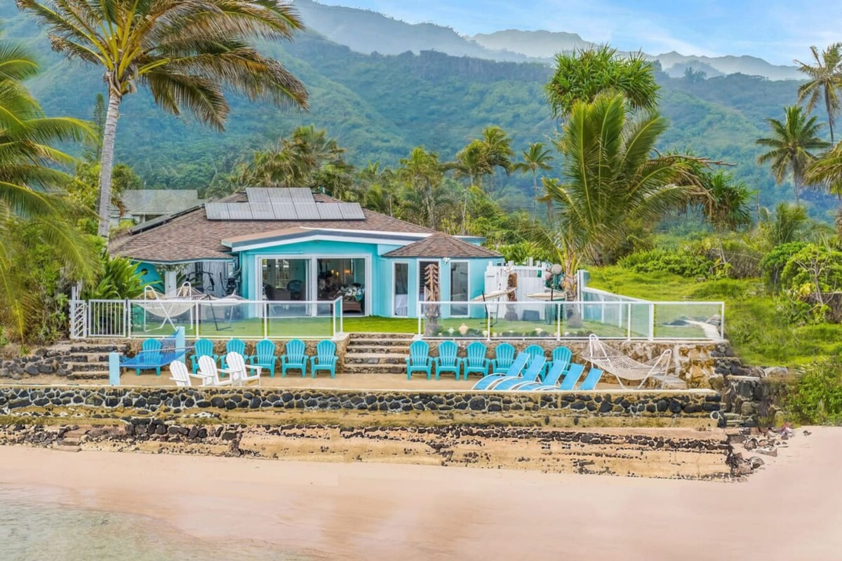 Tranquil bliss at home with private beach, waterfalls, Jurassic Valley Sea Cliffs, turquoise snorkeling reef, 80-inch Samsung 8K Home Theater System,7 two-person double-capacity hammocks,beachfront gym & gazebo with electrical outlets for laptops.