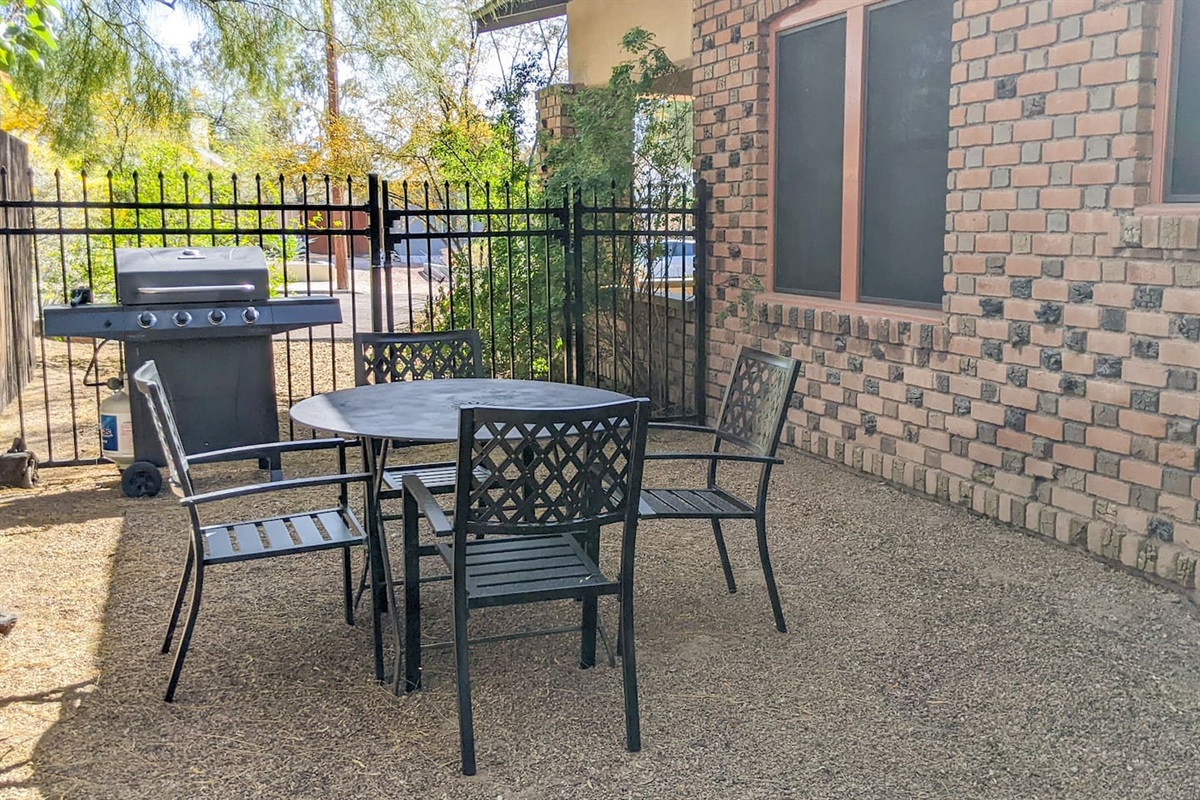 Outside dining area with grill