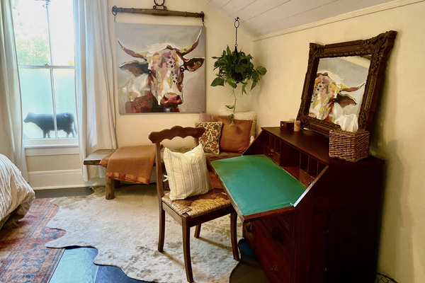 Need to answer an email between tastings—or feel inspired to write an actual love letter? This vintage secretary opens into a generous workspace, with cubbies and drawers to tuck everything away when it’s time to return to vacation.
