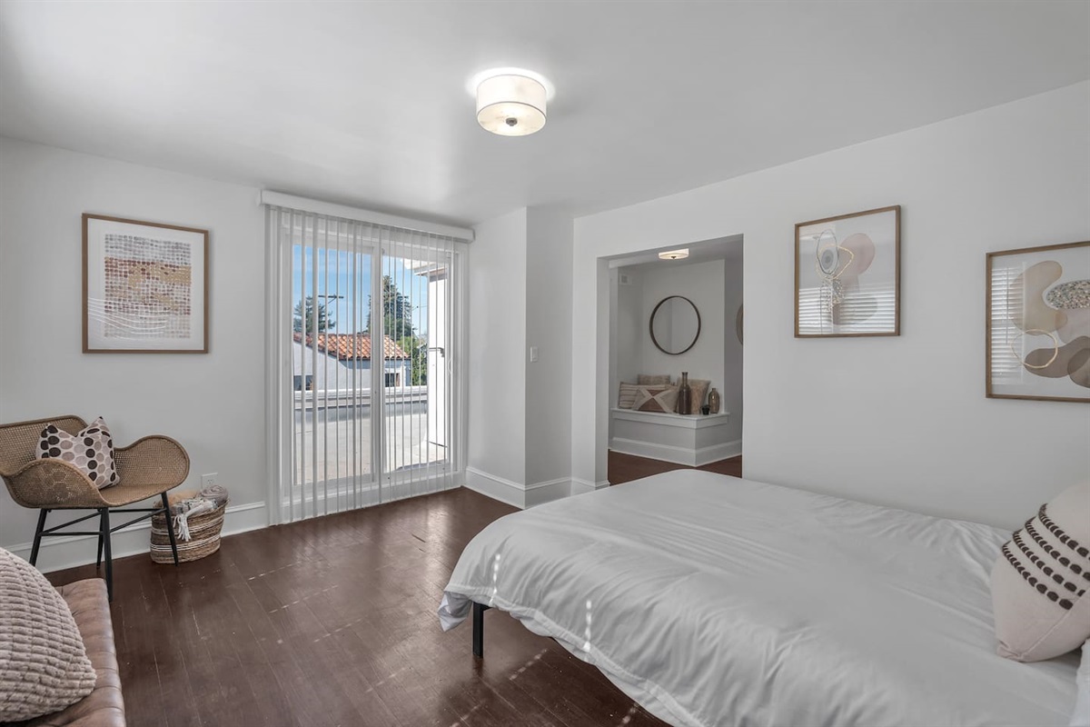 Wake up to sunshine in this fun, functional guest room.