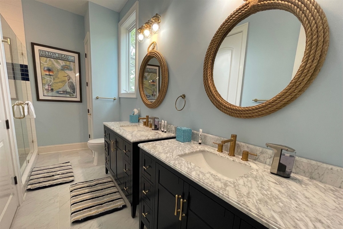Anchor's Down bathroom has nautical theme with 2 vanities