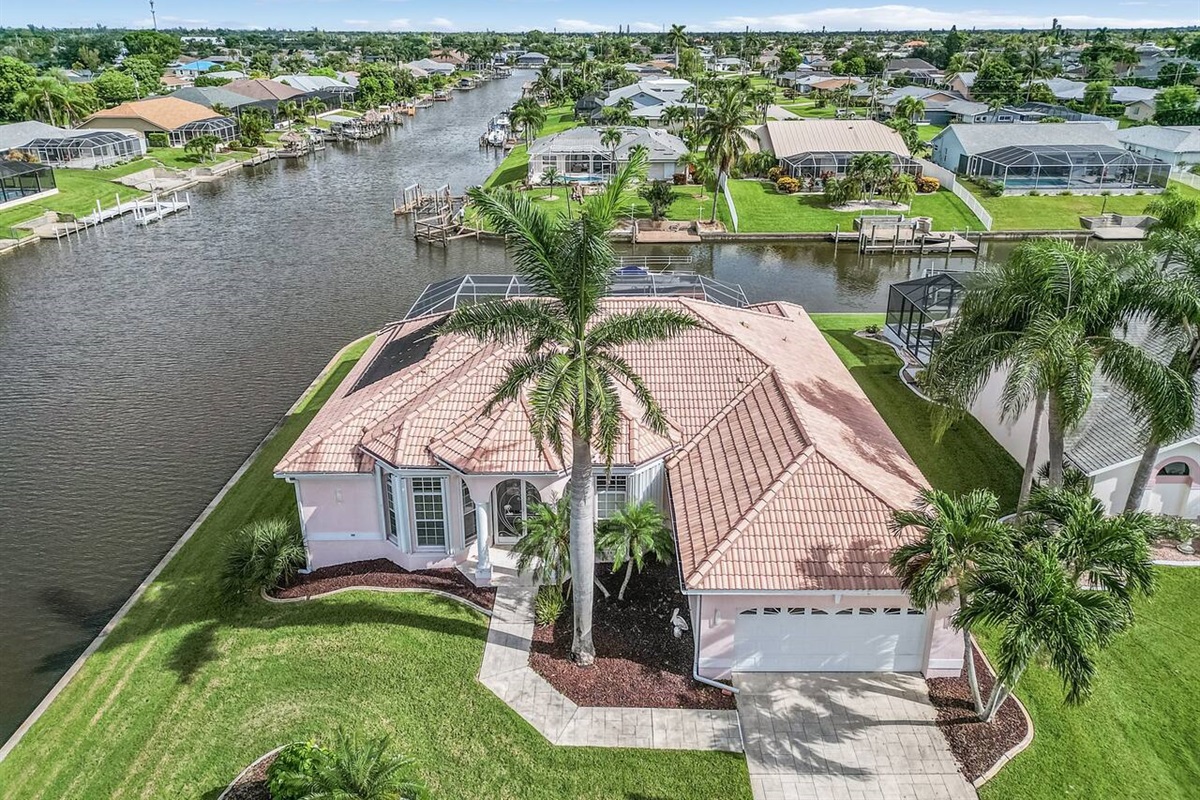 Stunning aerial views of Villa Heidi with breathtaking Gulf access and intersecting canals!