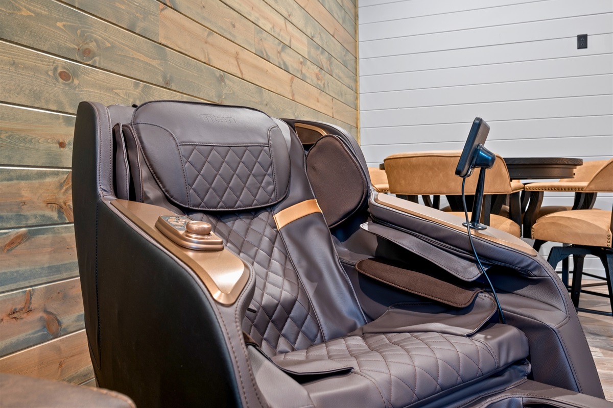 A plush massage chair offers the ultimate relaxation spot after a day of exploring the area.