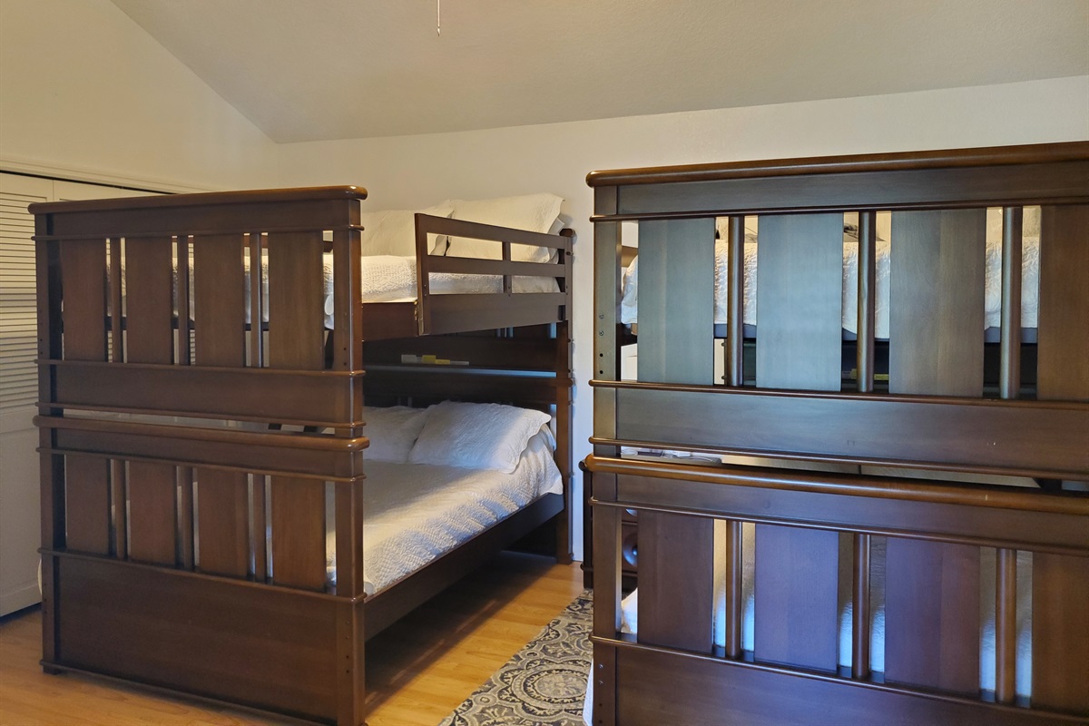 2nd level bunkbed room with 4 Double beds and private bathroom