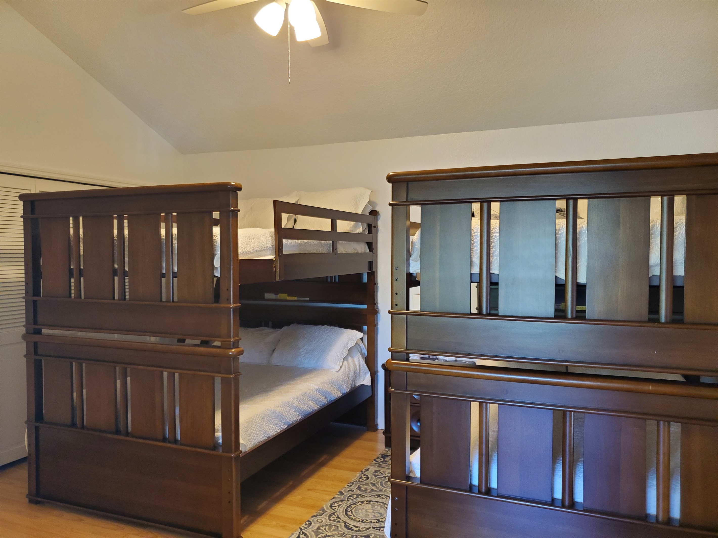2nd level bunkbed room with 4 Double beds and private bathroom