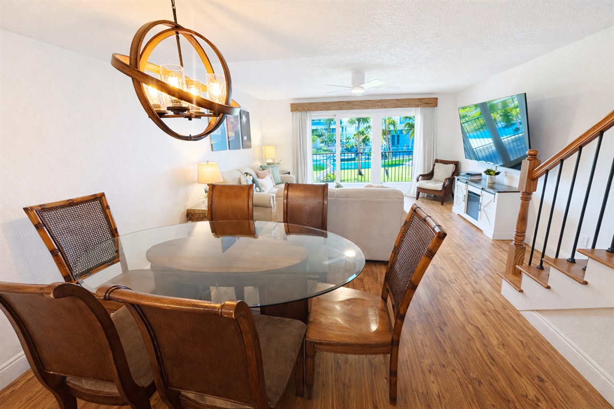 Dining room overlooking living room and balcony
