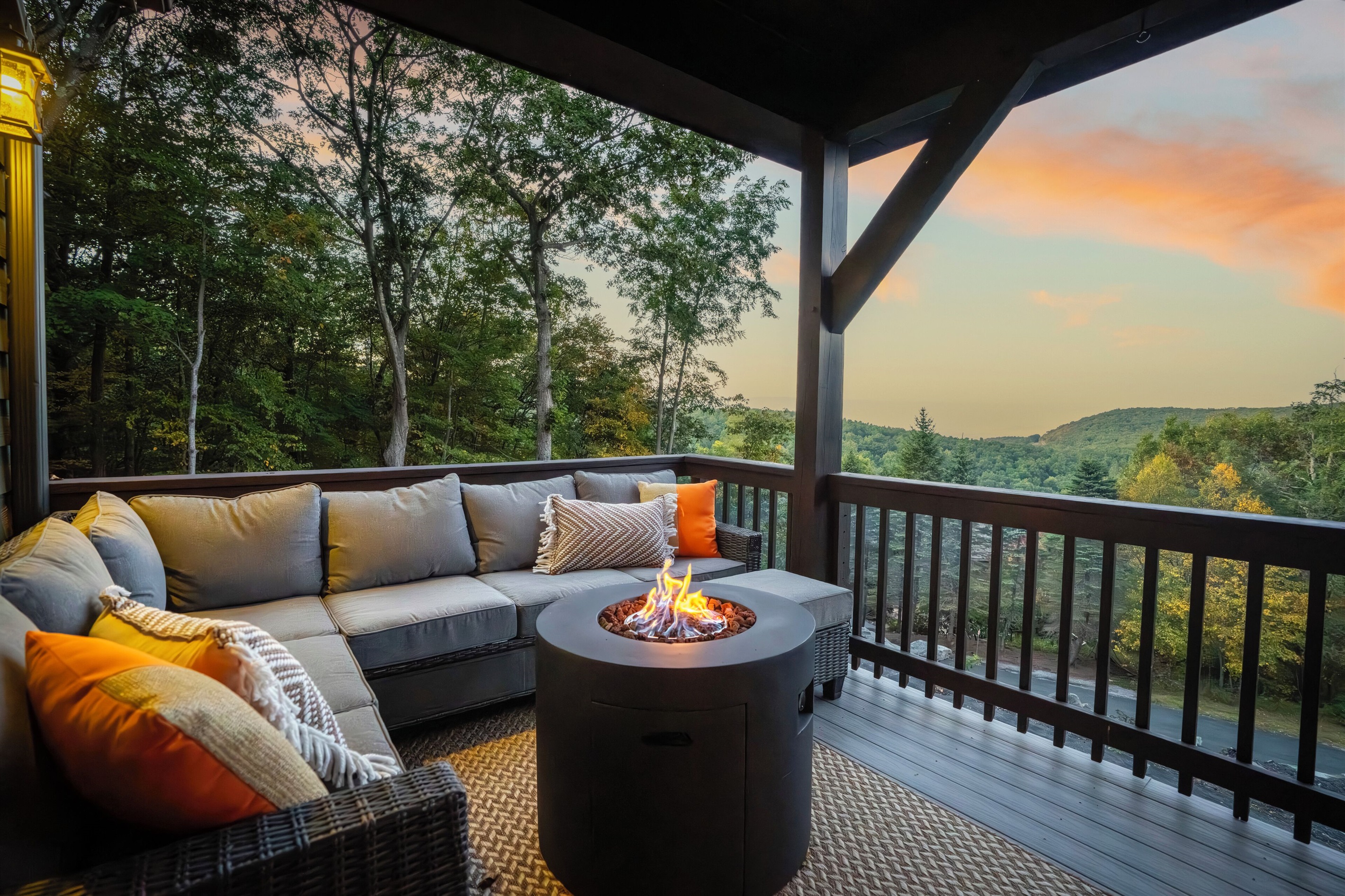 Upper deck with propane firepit and mountain views