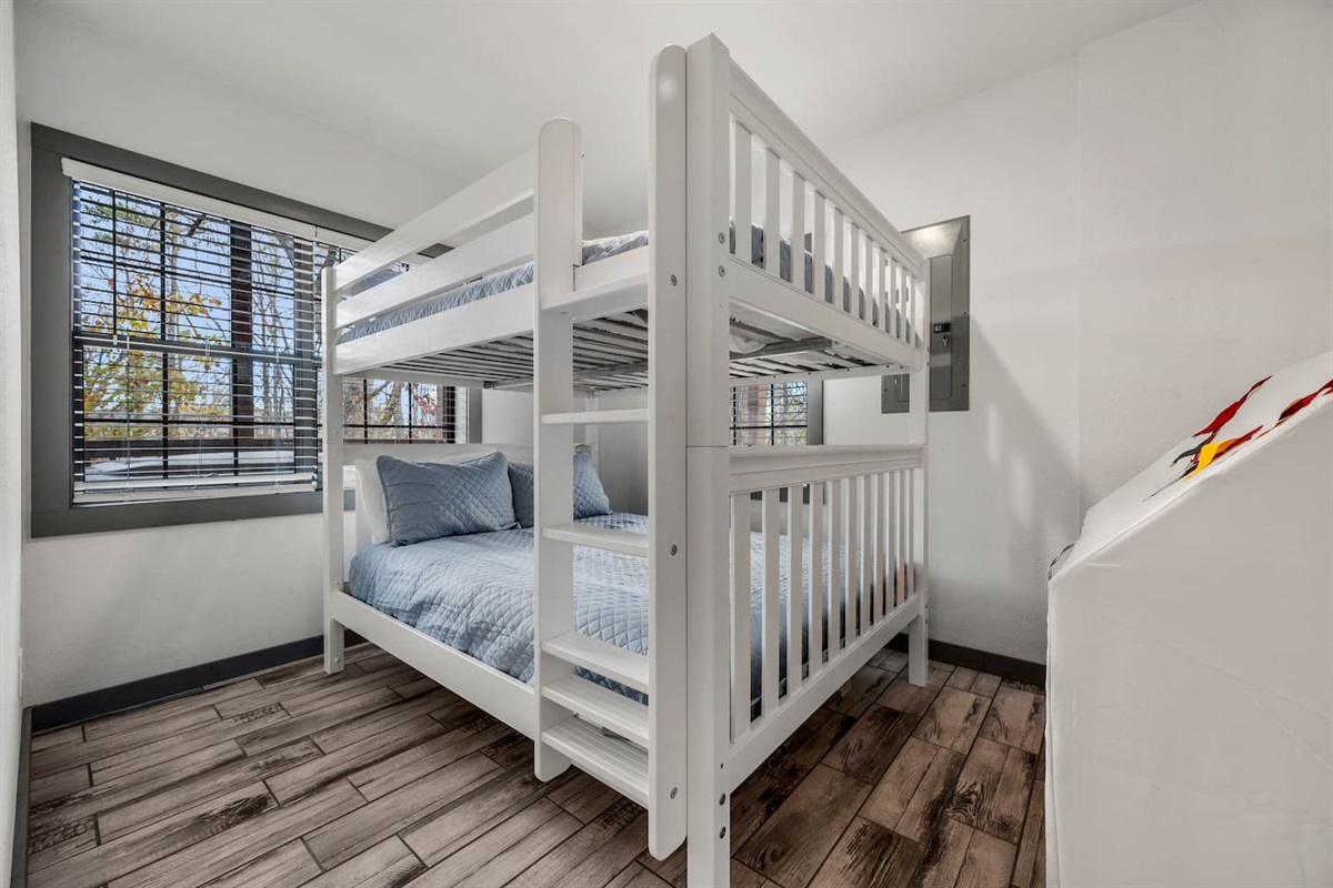 Downstairs Queen Bunk beds.  These are strong enough for adults.