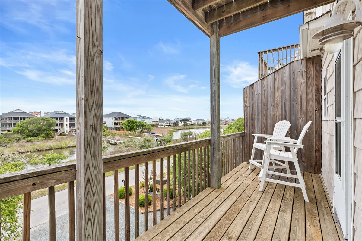 Private upper deck with elevated views of the canal and surrounding homes