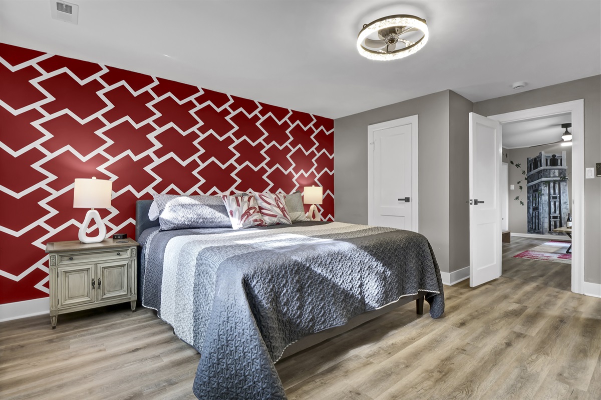 Enjoy privacy in this master bedroom with an en-suite bathroom.