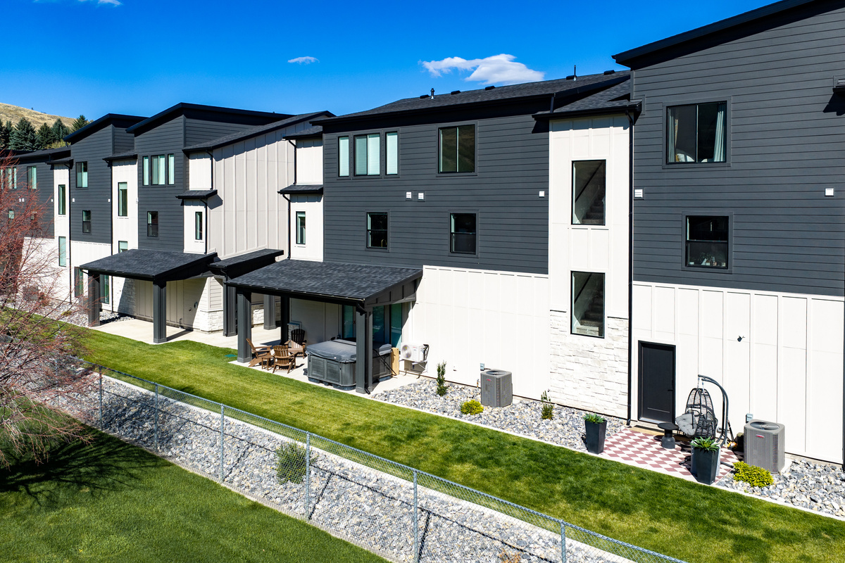 A modern Mountain Green townhome setting surrounded by open space and mountain scenery.