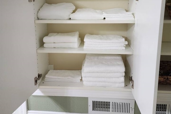 Upstairs bathroom linen cabinet includes everything you will need for your stay. Bathmats, bath towels, hand towels, wash rags, extra sheets & pillow cases.