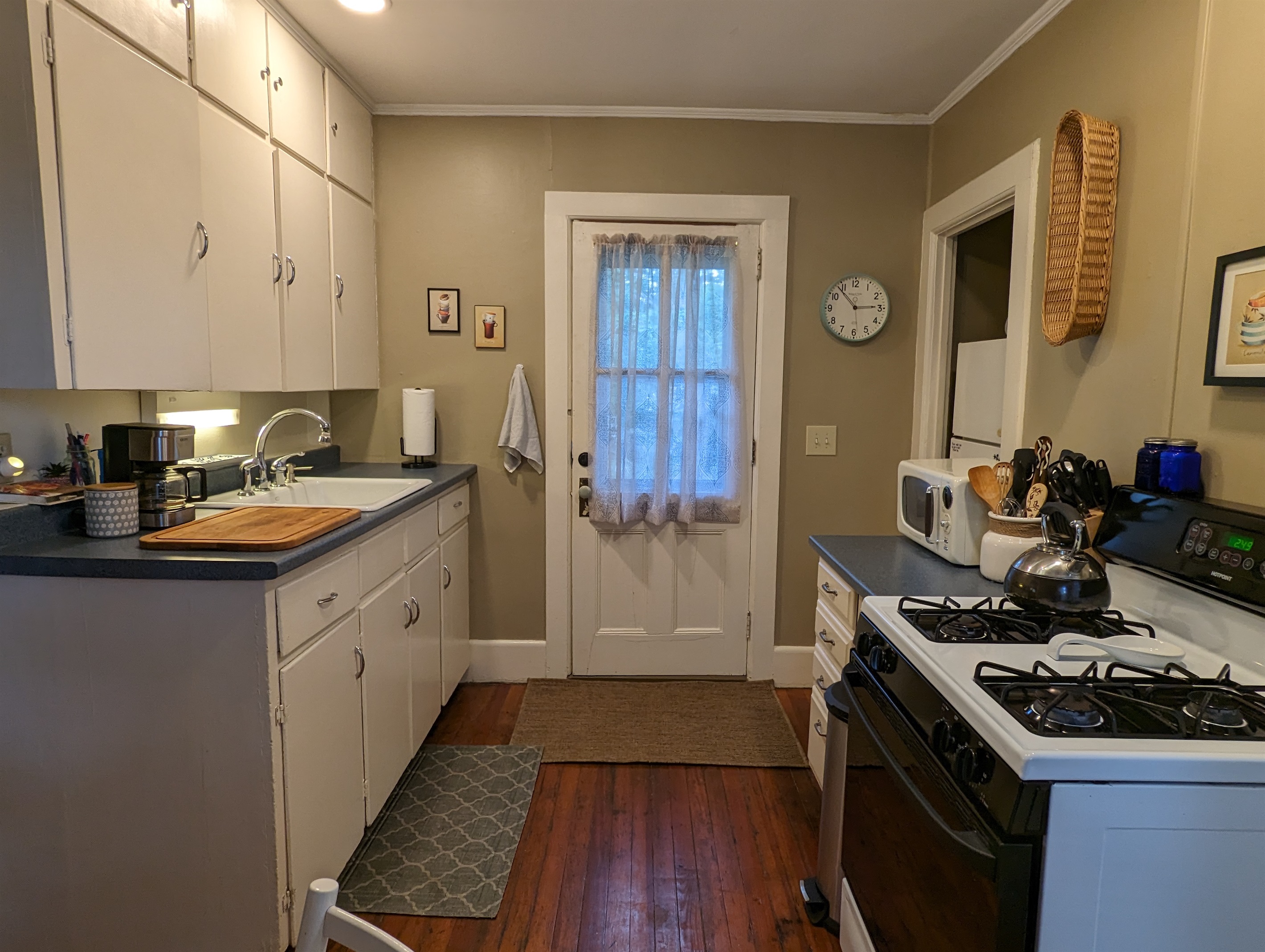 Kitchen with side door to back patio