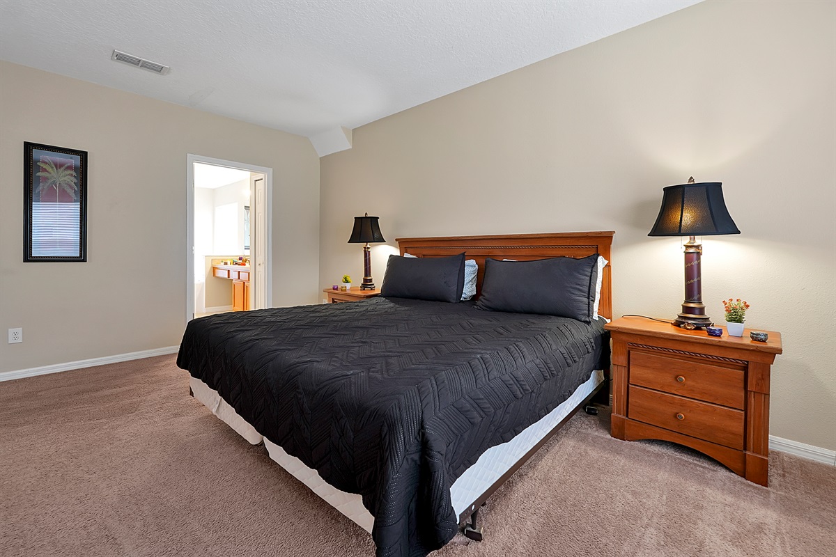 Perfect for guests who prefer easy access: this ground-floor master suite offers privacy and a full ensuite just steps away