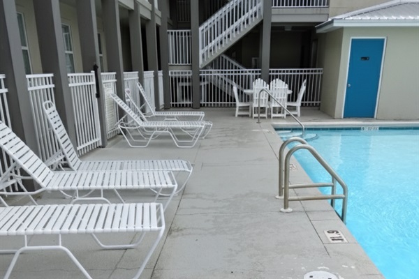 Enhance your stay at Summer Breeze Condominiums with our beautifully maintained communal pool area. Designed for guest enjoyment, it features comfortable sun loungers and easy access, making e
