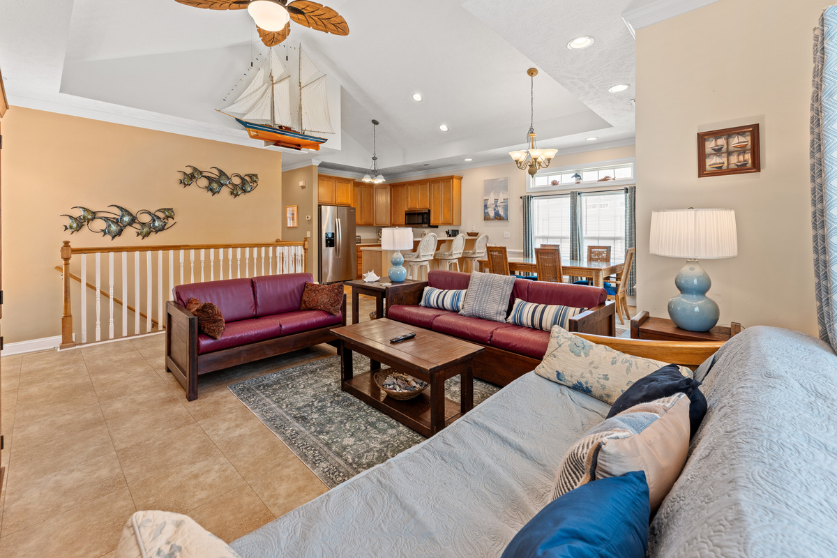 Family Room w/ vaulted ceilings and open floor plan